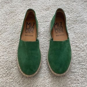 Green suede slip-on shoes